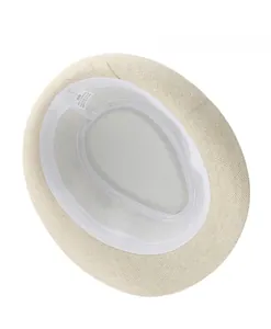 Detail view of straw sun hat inner lining with 100% paper material label and size tag