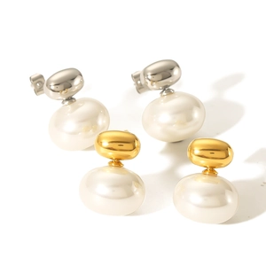 French geometric pearl earrings in gold and silver finish on white background