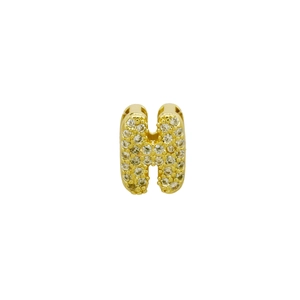 Close-up of golden bubble letter H pendant with shimmering cubic zirconia micro-pave