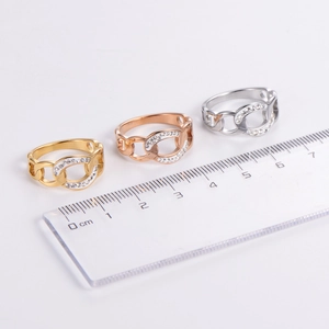 Three-piece chain ring set in gold, rose gold, and silver finishes with pavé white zircons