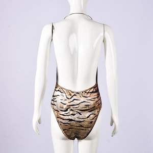 Detail view of the open back and tiger print texture on a slim-fit bodysuit