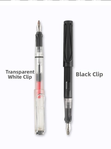 Close-up of matte black and transparent fountain pens with signature U-shaped wire clips