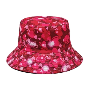 Detail of red and pink heart print on a high-quality synthetic fabric fisherman hat