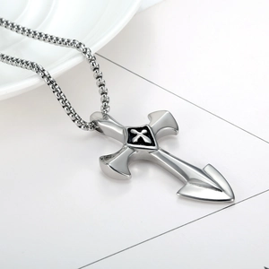 Polished silver stainless steel necklace featuring a cross pendant and box chain