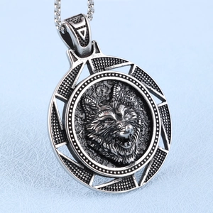 Retro wolf head embossed pendant necklace in vintage silver finish on blue leather