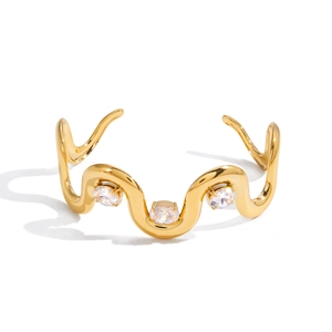 Elegant 18K gold plated stainless steel wavy open bangle with three white zircons