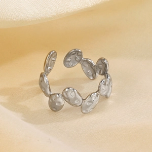 Irregular hammered oval stainless steel open ring with a silver textured metallic finish