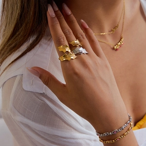Bague ouverte en acier inoxydable en forme de feuille, finitions dorée et argentée