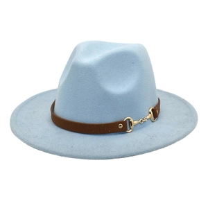 Detail of light blue wool fedora featuring a brown leather band and gold horsebit buckle