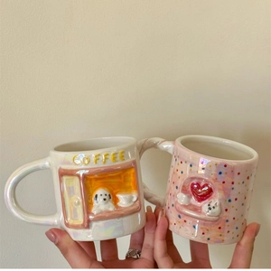 Pearlescent ceramic mug set featuring 3D embossed puppy and heart cat designs