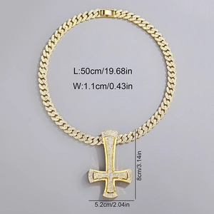 Gold iced out inverted cross pendant with 1.1cm wide Cuban link chain and diamond details