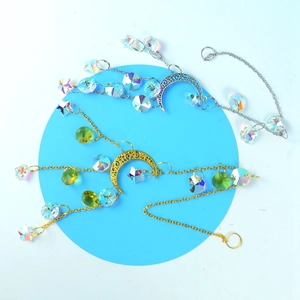Star and moon suncatcher pendants with colorful crystals in gold and silver finishes