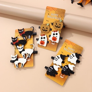 Glittery Halloween hair clips set featuring pumpkin ghost and cat designs for kids