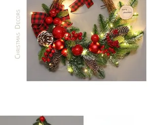 Detail of Christmas wreath with pine needles, red berries, cones, and LED lights