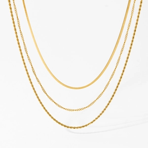 Three-layer gold stainless steel necklace set with snake and twist chain designs