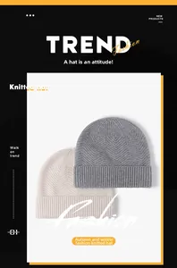 Detail of chunky beige and grey wool knit beanies with textured herringbone pattern