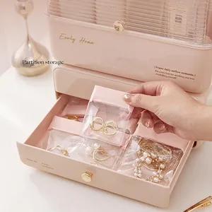 Pink jewelry organizer box with transparent lid and anti-oxidation storage bags
