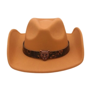 Detailed view of camel felt cowboy hat with leather band and bronze leopard emblem