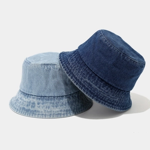Classic washed denim bucket hats in dark and light blue for sun protection and outdoor style