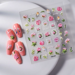 Detailed 3D nail art stickers with embossed pink roses, birds, and floral frames