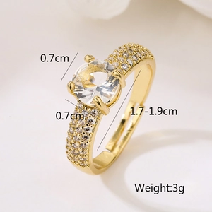 Macro shot showing dimensions of a gold-plated zircon ring with a 0.7cm main stone