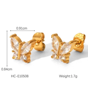 Detailed view of butterfly zircon stud earrings with dimensions 0.91cm width and 0.84cm height