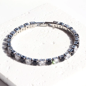 5mm silver tennis bracelet with alternating black and white cubic zirconia on stone base