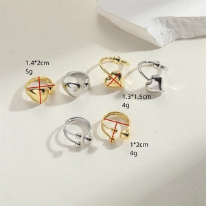 Minimalist adjustable open heart ring set in polished gold and silver metal finishes