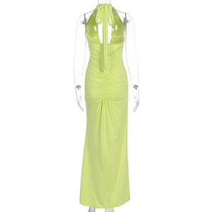 Detail of lime green backless maxi dress featuring ruched back and halter tie design