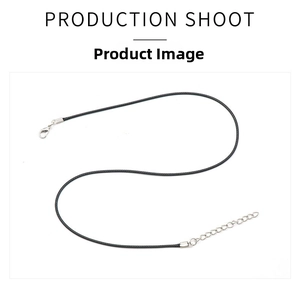 Detail of black wax cord necklace with silver lobster clasp and adjustable chain extender