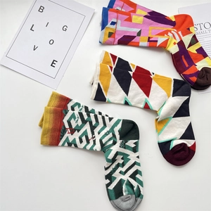Three pairs of French oil painting style cotton mid-calf socks with geometric patterns