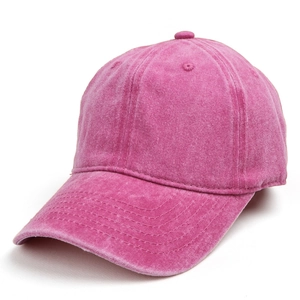 Close-up of vintage washed pink cotton baseball cap with detailed stitching and vent holes