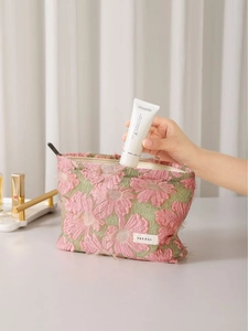 Pink floral jacquard makeup bag with large capacity and zip closure in light green fabric