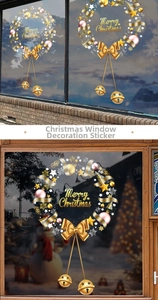 Detail of Christmas wreath window sticker with golden bells and Merry Christmas text