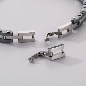 Detail of mechanical lock and industrial stainless steel links on anchor chain bracelet
