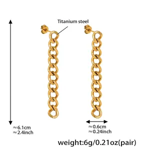 Detail view of vintage golden titanium steel Cuban link earrings measuring 6.1cm long