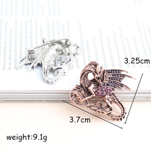 Western dragon brooch with crystals in antique silver and bronze finishes, 3.7cm length
