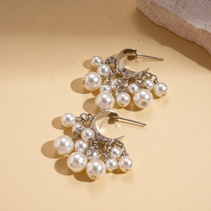 Vintage geometric C-shaped silver earrings with cascading white pearl tassels for women