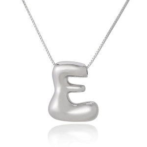 Polished silver 3D letter E pendant on a fine box chain over white background