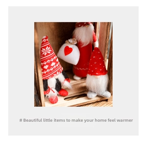 Three festive Christmas gnomes in a wooden crate with knit textures and white hearts