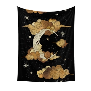 Detail of vintage celestial tapestry featuring man in the moon and scrollwork clouds