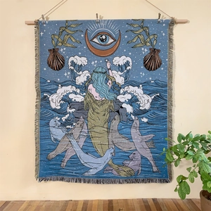 Bohemian blue mermaid woven tapestry with oceanic patterns and decorative tassels