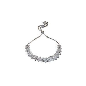 Elegant silver adjustable bolo bracelet featuring sparkling clustered geometric crystals