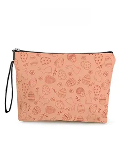 Detail of Easter bunny pattern on a canvas makeup bag with a sturdy zipper closure