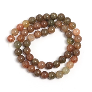 Macro view of multi-color dragon-vein glass round beads for DIY jewelry making