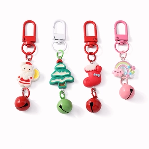 Christmas keychain set with Santa Claus, tree, sock and rainbow charms with bells