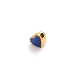 Detail of a blue enamel heart charm with gold finish and hole for DIY jewelry making