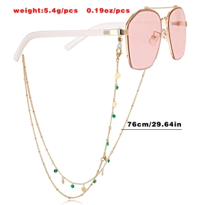 Pink octagon sunglasses with multilayer gold metal chain featuring green beads and hearts
