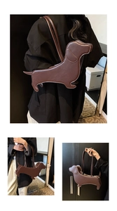 Detail of dark brown dachshund shaped leather tote bag worn as a creative shoulder bag