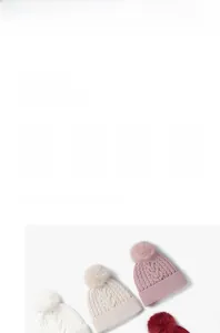 Detailed knit pattern and faux fur pom-poms on thickened thermal winter beanies